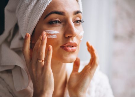 woman-applying-face-